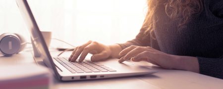 Woman sitting at desk Woman sitting at desk
